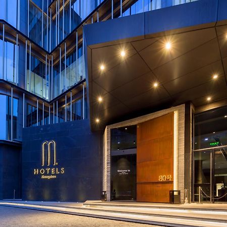 M Hotel Zhengzhou Bagian luar foto
