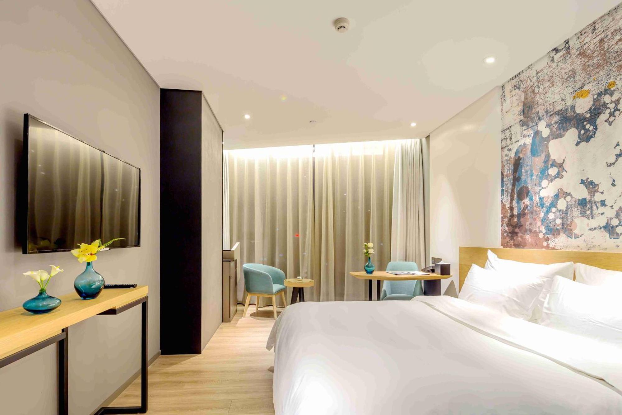 M Hotel Zhengzhou Bagian luar foto