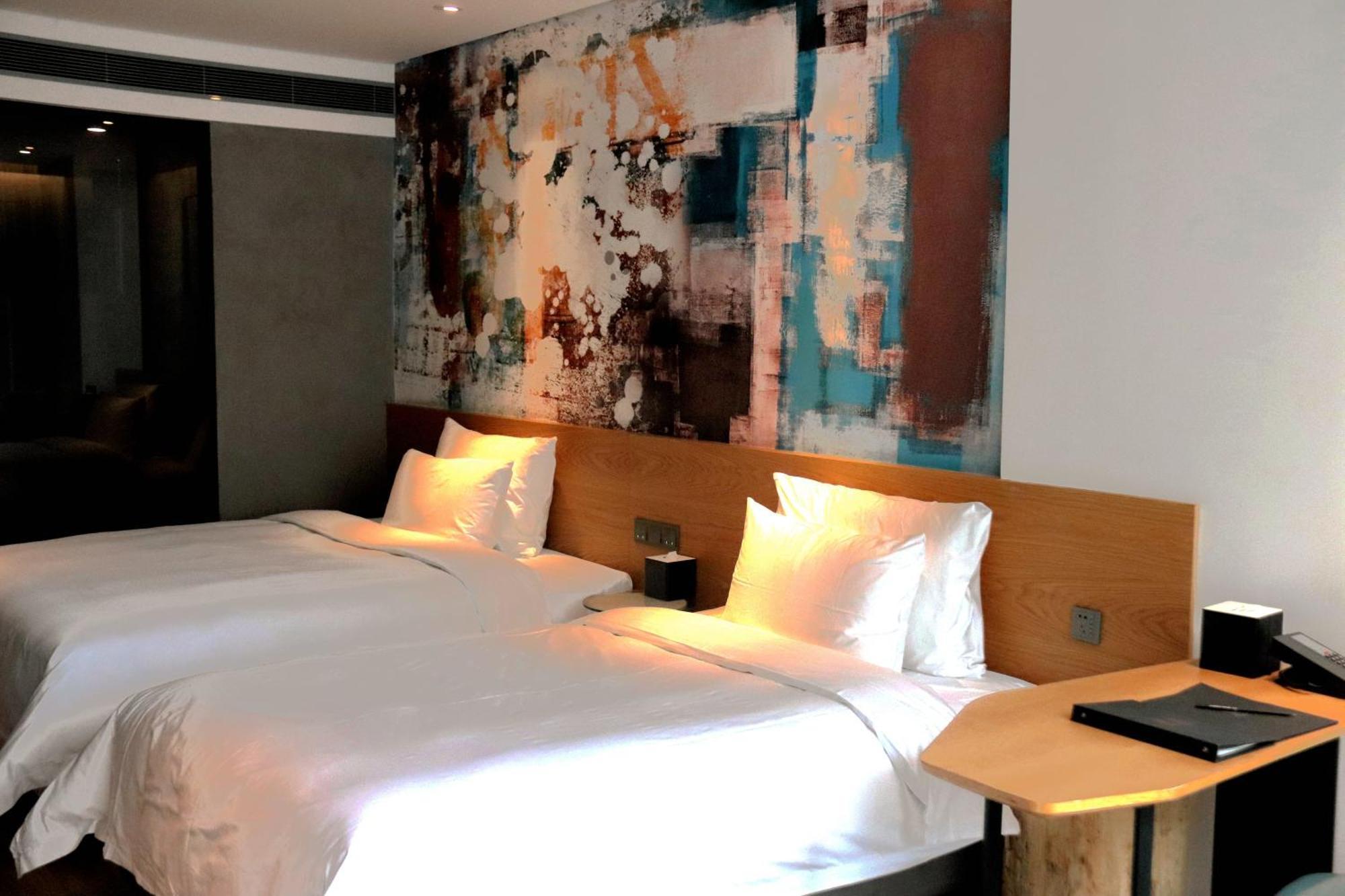 M Hotel Zhengzhou Bagian luar foto