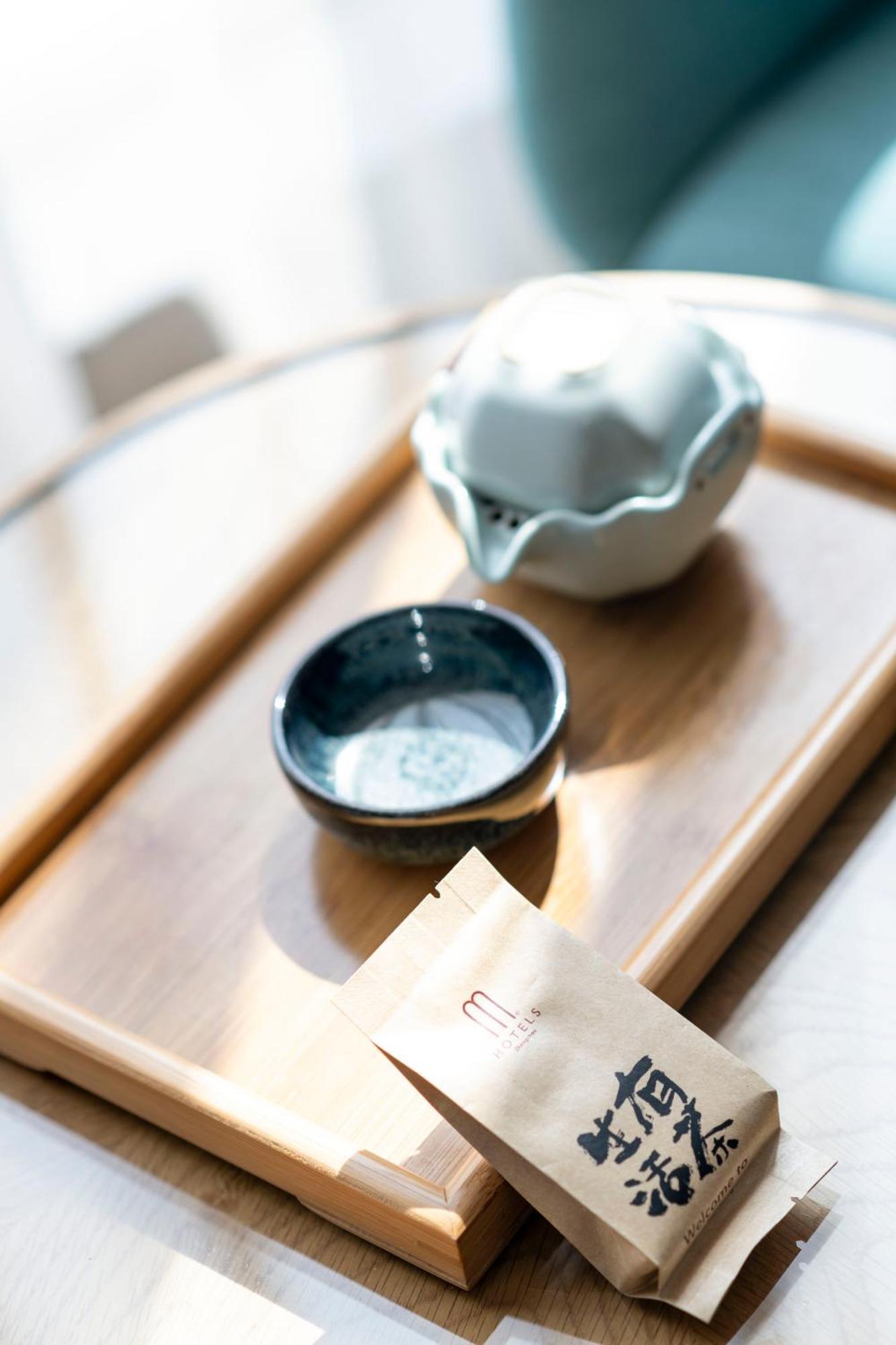 M Hotel Zhengzhou Bagian luar foto