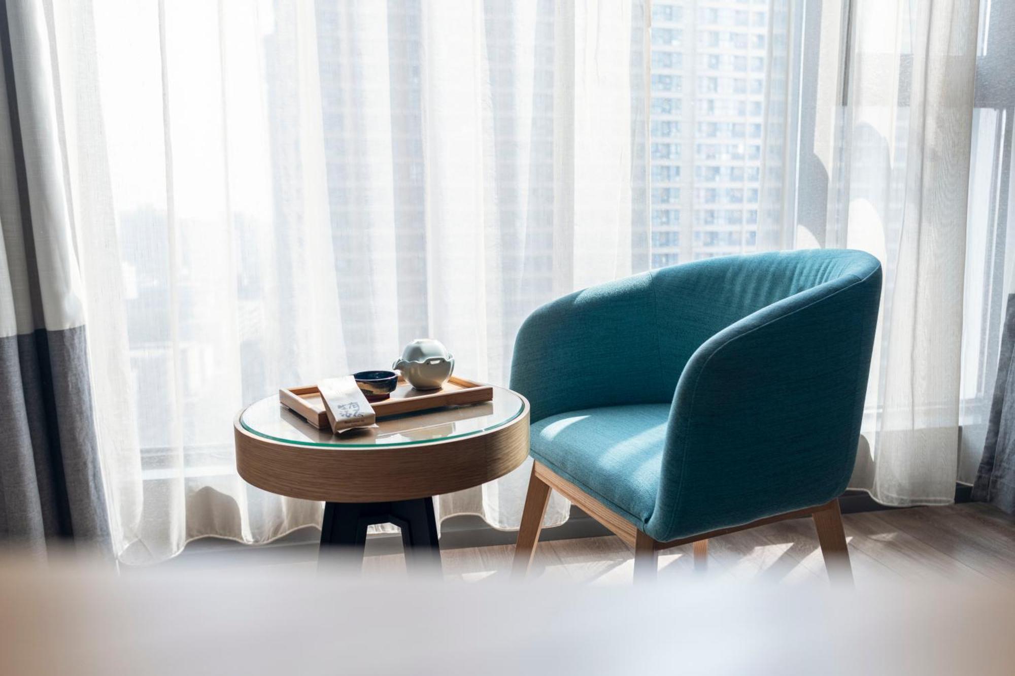 M Hotel Zhengzhou Bagian luar foto