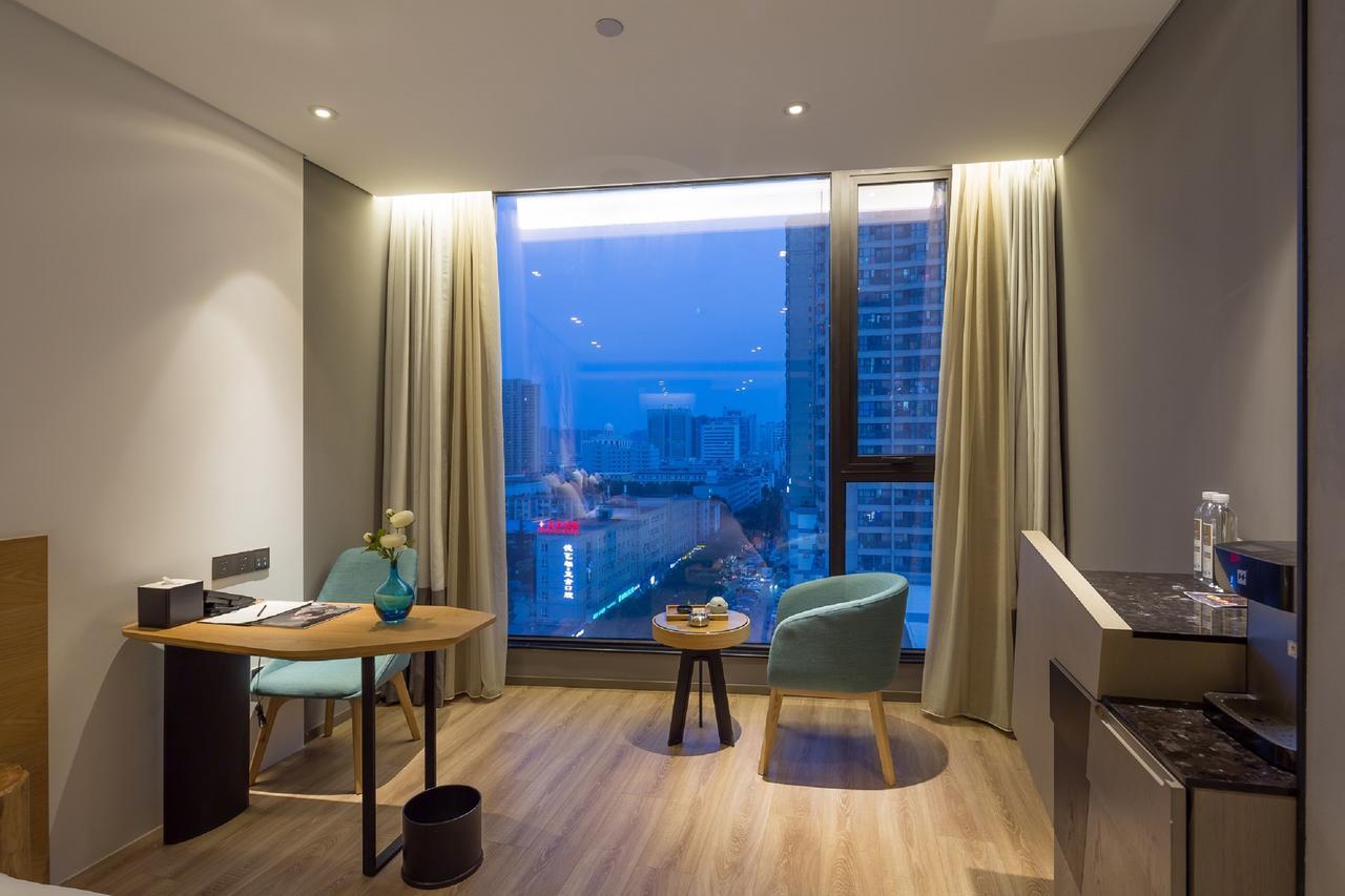 M Hotel Zhengzhou Bagian luar foto