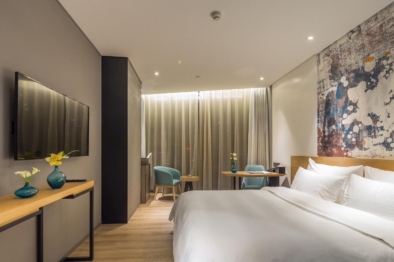 M Hotel Zhengzhou Bagian luar foto