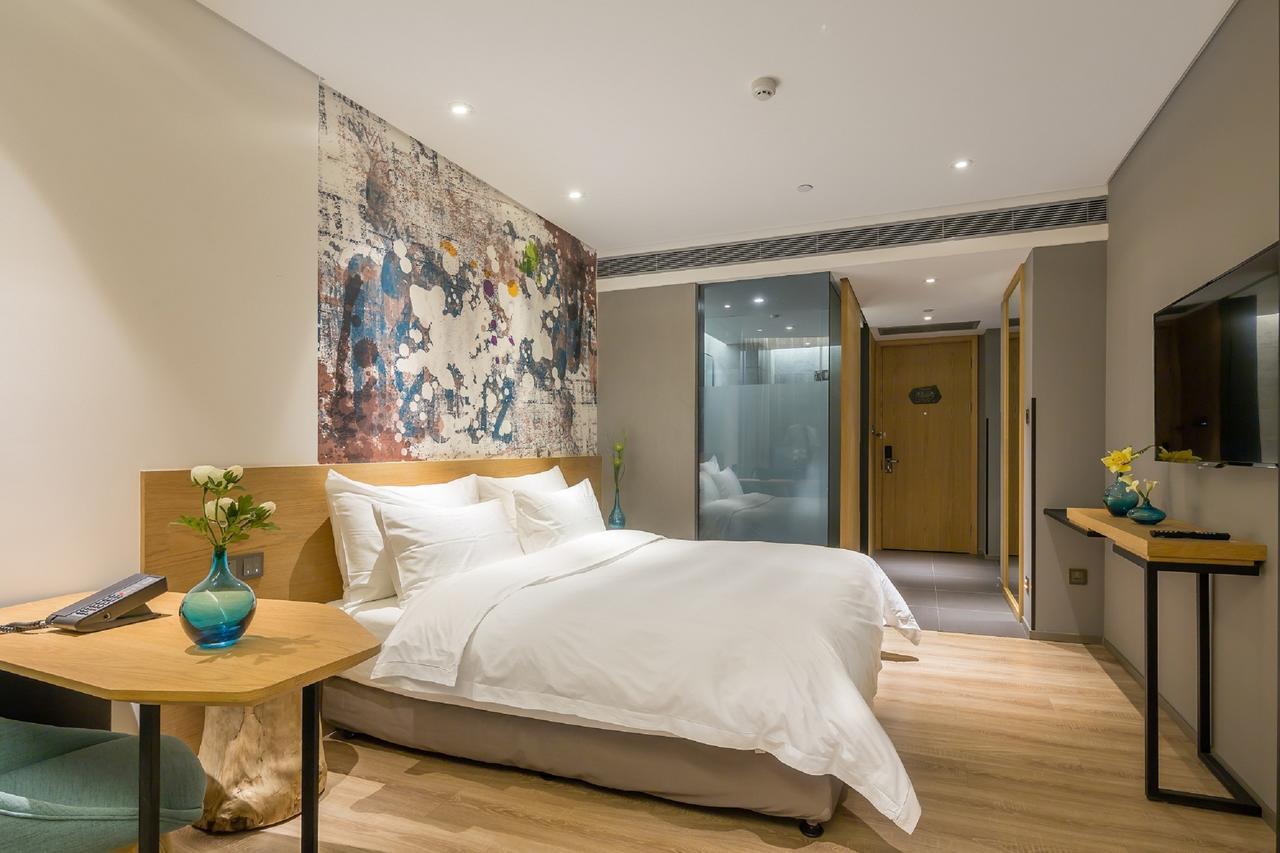 M Hotel Zhengzhou Bagian luar foto
