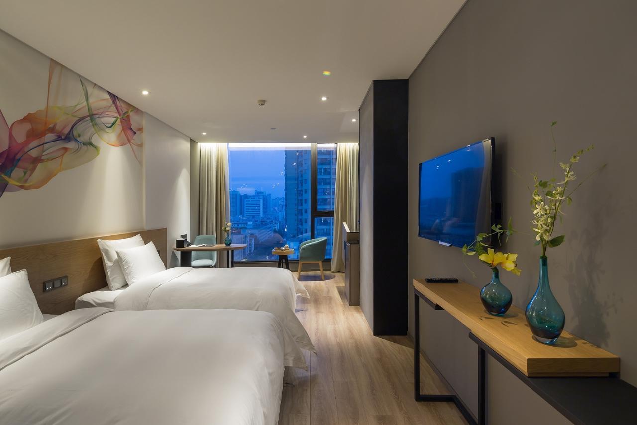 M Hotel Zhengzhou Bagian luar foto