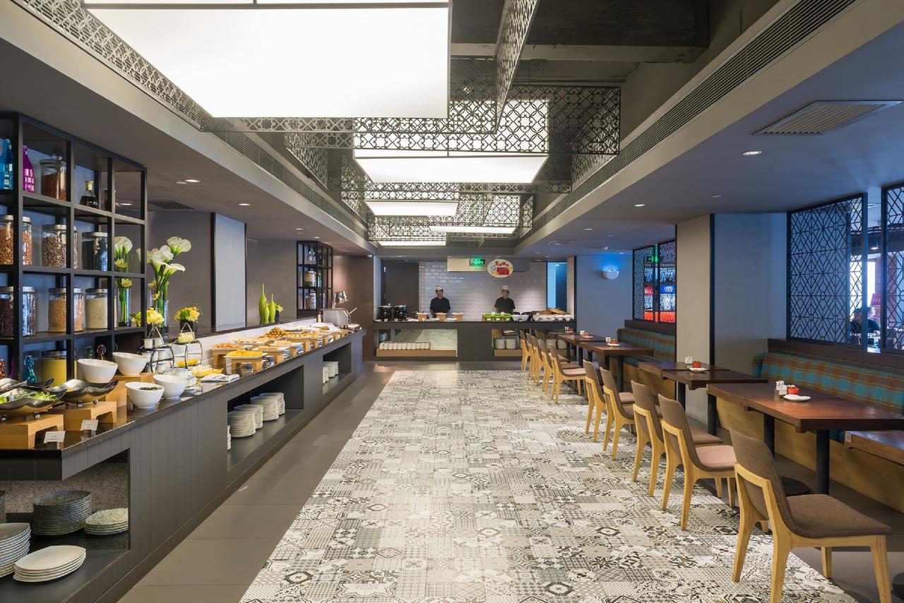 M Hotel Zhengzhou Bagian luar foto