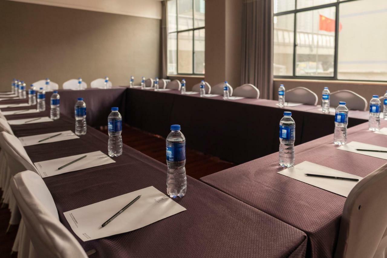 M Hotel Zhengzhou Bagian luar foto